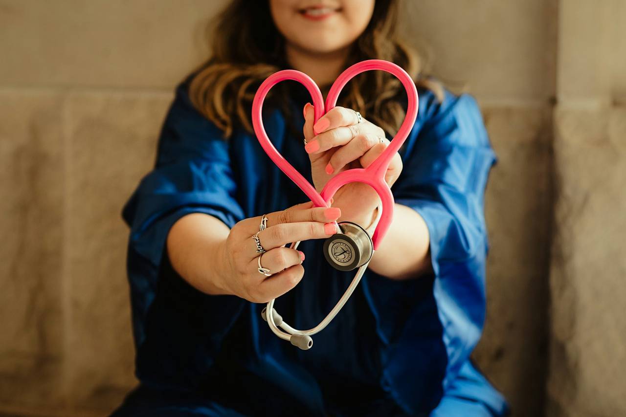 Stethoscope held in the shape of a heart